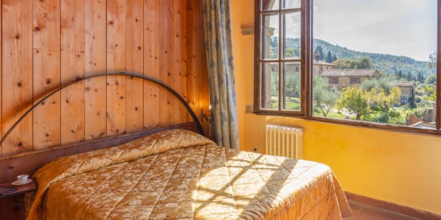 One of the estate's apartments, with beamed ceilings and terracotta floors